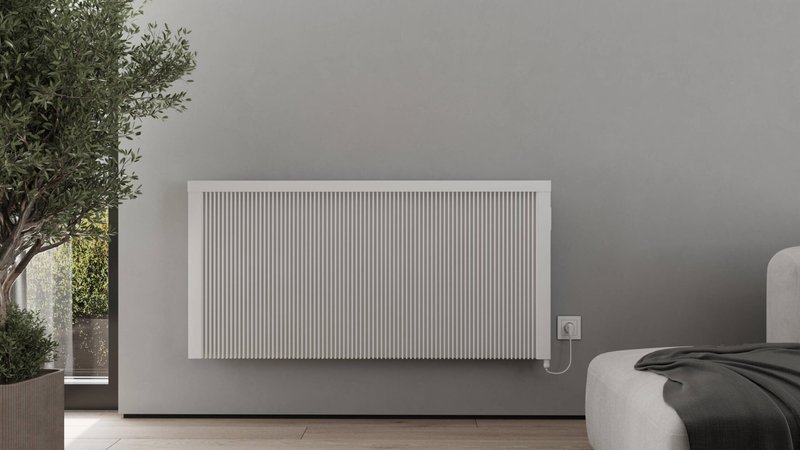 Modern horizontal electric radiator in contemporary living room