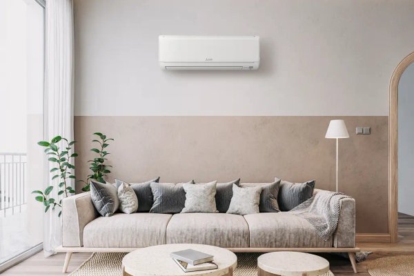 Air-to-air heat pump indoor wall unit in modern living room